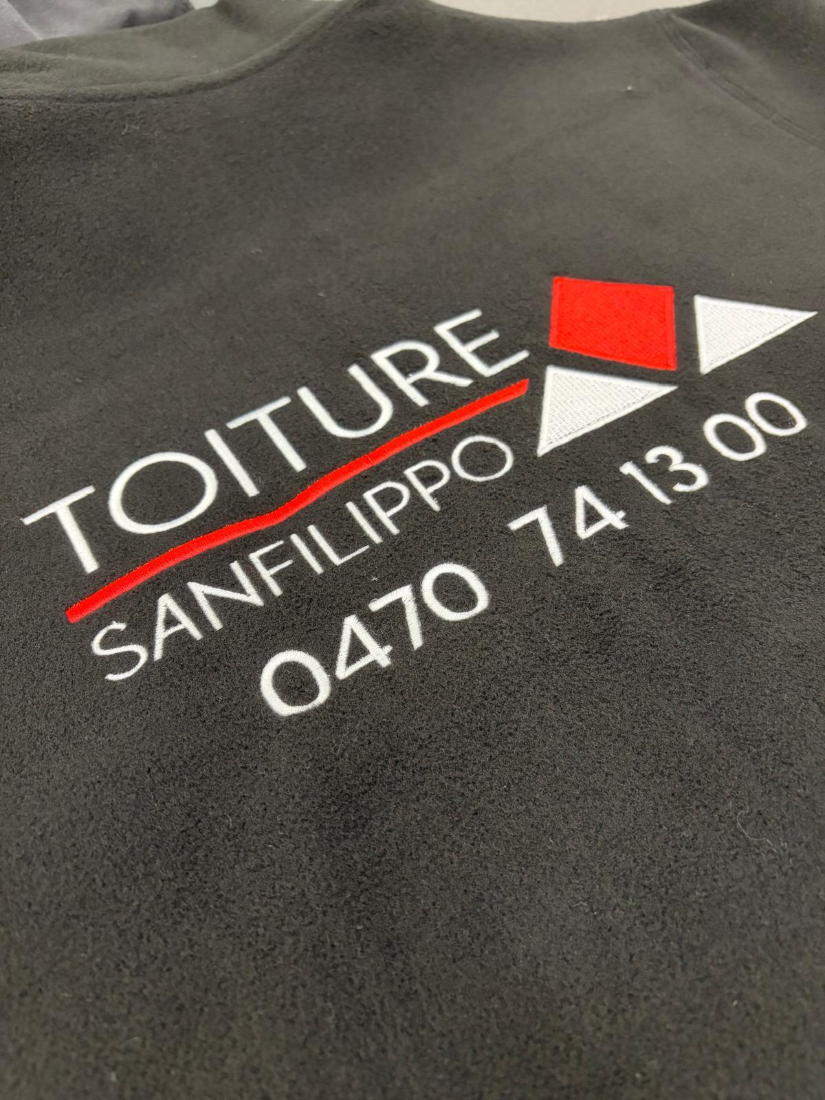 Flocage DTF couleur sur des vêtements de travail dans notre atelier à Thumaide