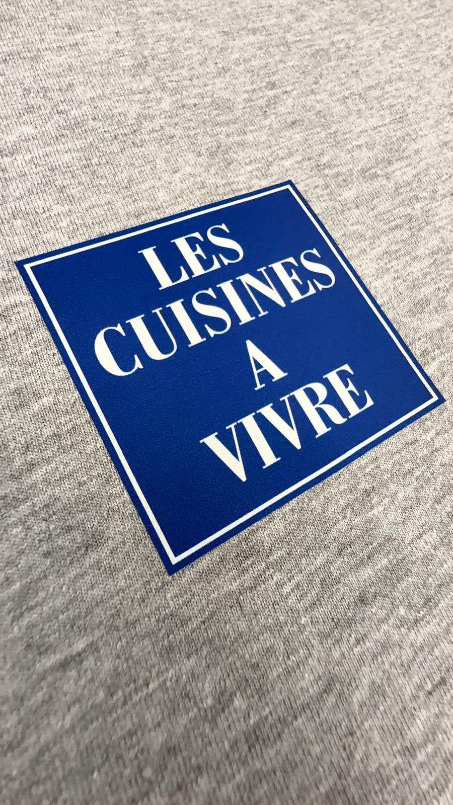 Flocage DTF couleur sur des vêtements de travail dans notre atelier à Thumaide